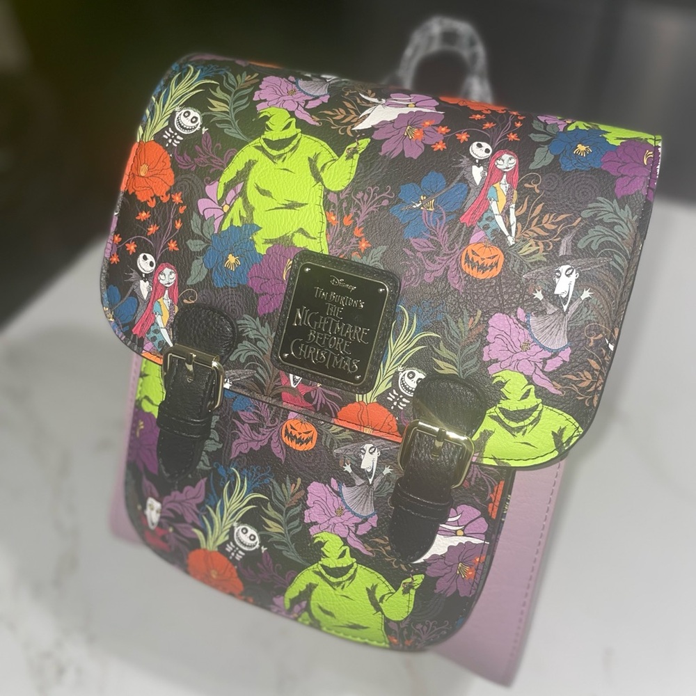 Loungefly NBC Allover print buckle mini backpack